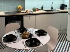 Aneks kuchenny i kącik jadalniany w apartamencie 2+2 Superior Boho