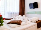 Sypialnie apartamentów są nowocześnie urządzone