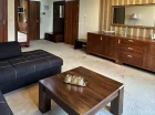 Apartament classic ma osobną sypialnię i salon