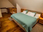 Sypialnia w apartamencie Maisonette 2+2